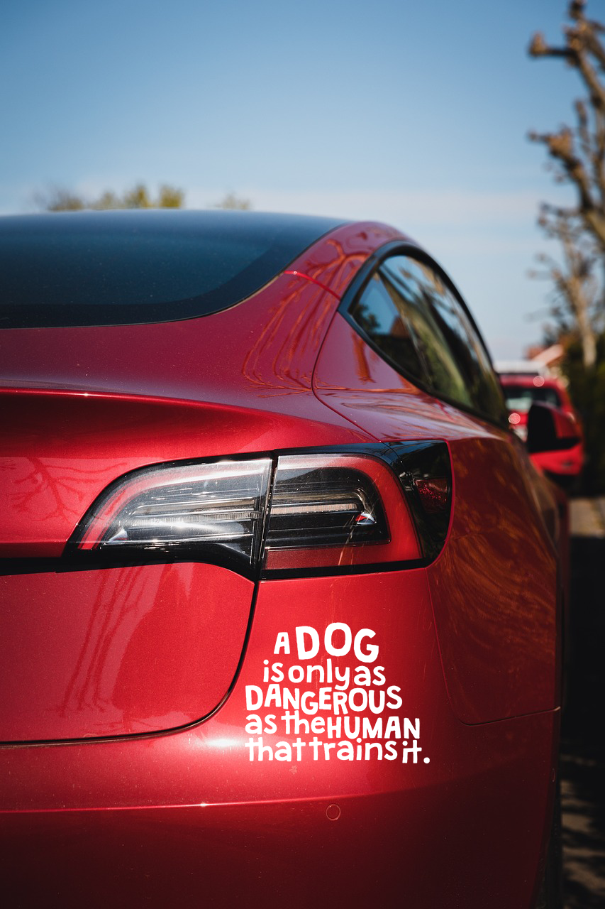 A Dog is only as Dangerous as the Human That Trains it Vinyl Car Sticker