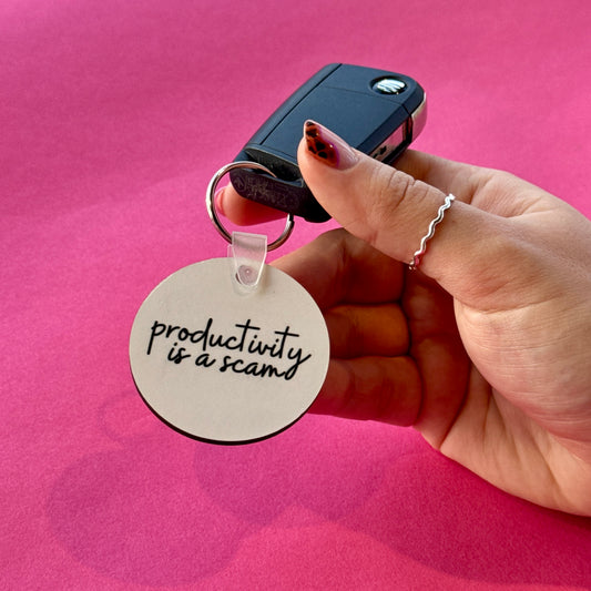 Productivity is a Scam Keyring