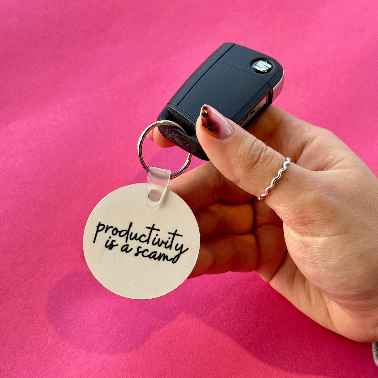 Productivity is a Scam Keyring